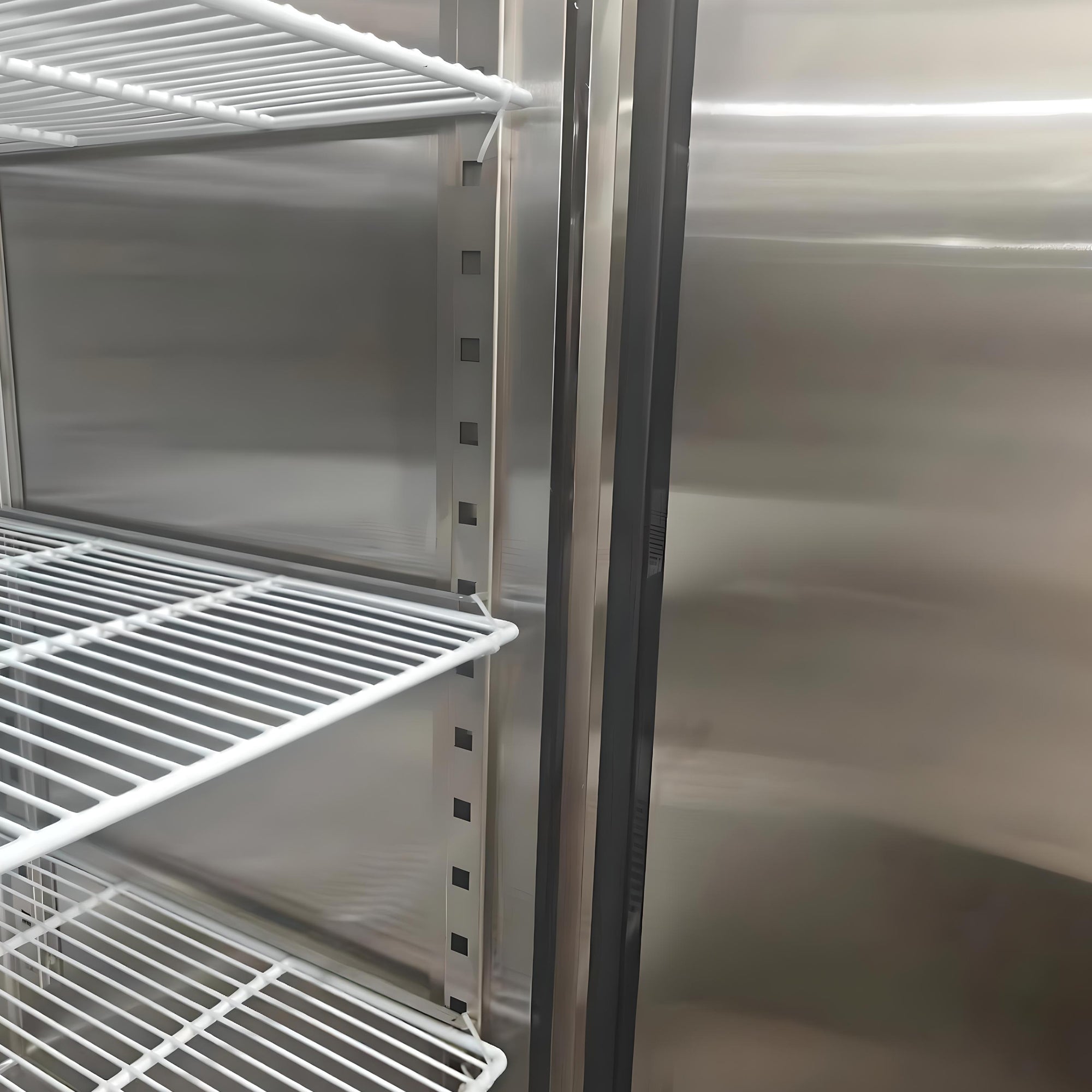 Closeup of the removable shelves inside the Kenmore Pro 49 cu ft commercial reach-in solid door stainless steel convertible freezer/refrigerator